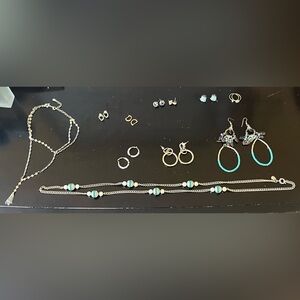 Assorted costume jewelry including J. Crew necklace and velvety plush case